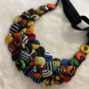 Collier artisanal multicolore en tissu Collier artisanal multicolore en tissu fait main avec boutons recouverts