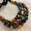 Collier artisanal multicolore en tissu Collier artisanal multicolore en tissu fait main avec boutons recouverts